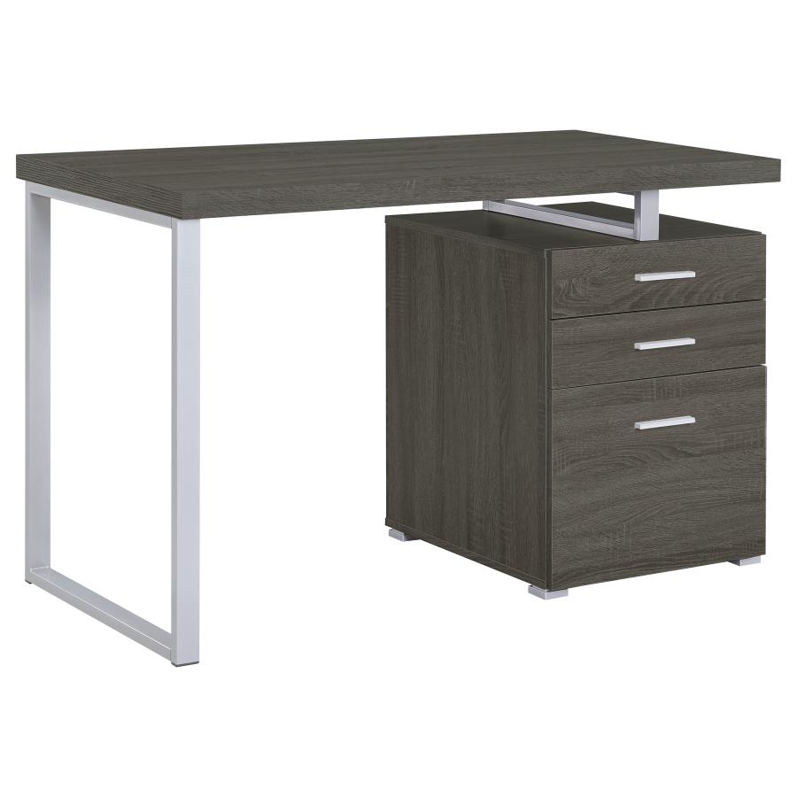 3-Drawer Brennan Office Desk Weathered Grey 800520 By Coaster Furniture | Mobilia Cleopatra 3 3-drawer Brennan Office Desk Weathered Grey 800520 by Coaster Furniture - Image 1