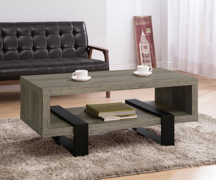 Dinard Coffee Table With Shelf Gray Driftwood 720878 By Coaster Furniture | Mobilia Cleopatra 3 Dinard Coffee Table with Shelf Gray Driftwood 720878 By Coaster Furniture - Image 1